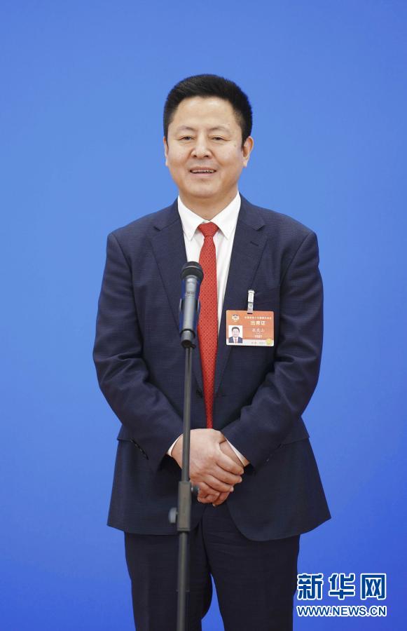 你的“命”，在我“心”上——兩次走上“委員通道”的敖虎山委員